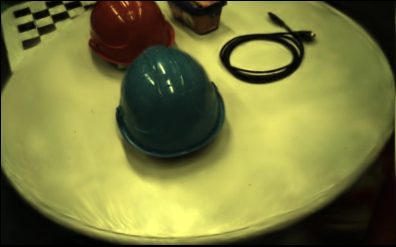 Sharper RoMo-GS reconstruction of the same tabletop scene.